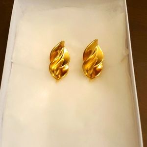 Goldtone swirl ribbon stud earrings